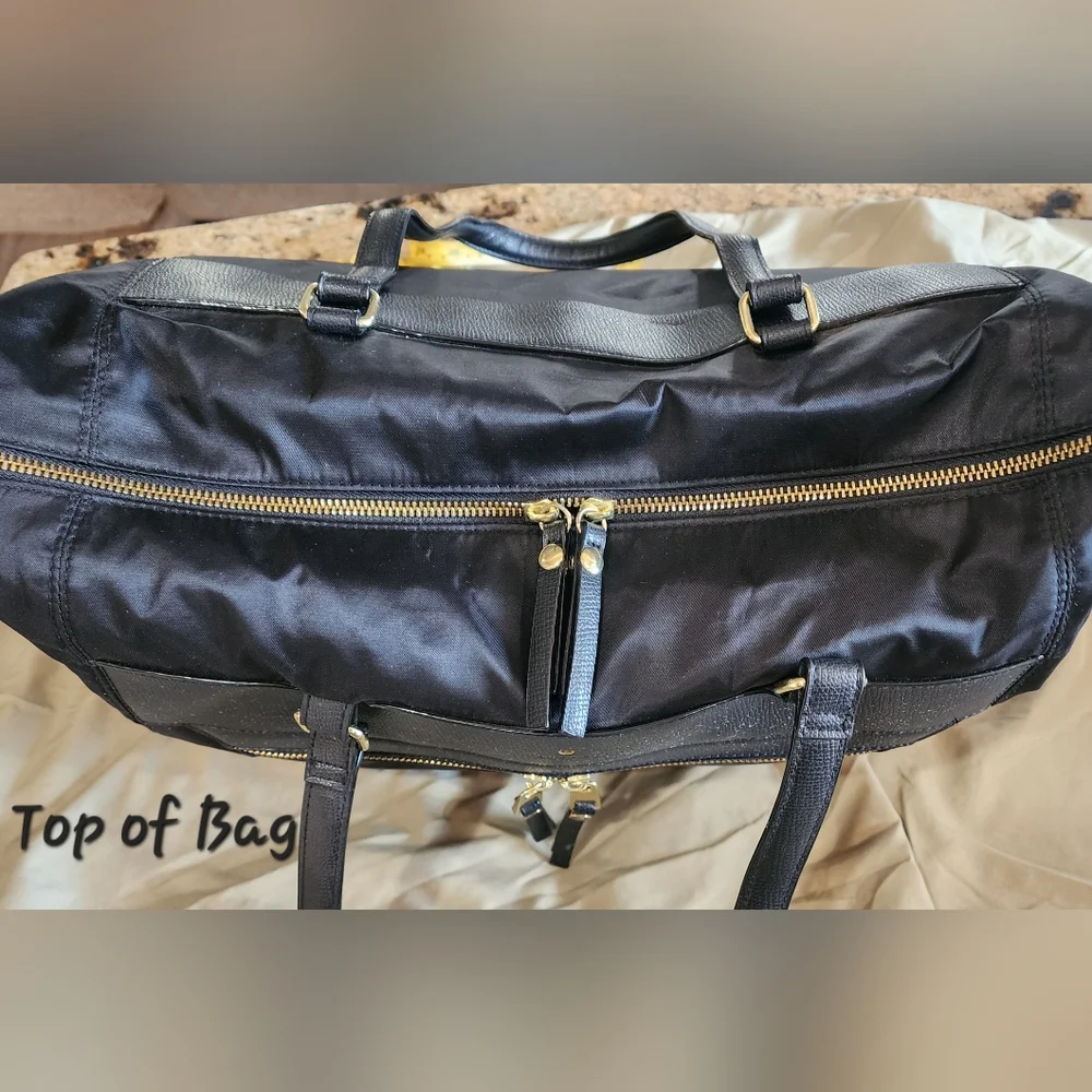 Travanti Black Large Laptop Bag with Gold Accents and Red Interior